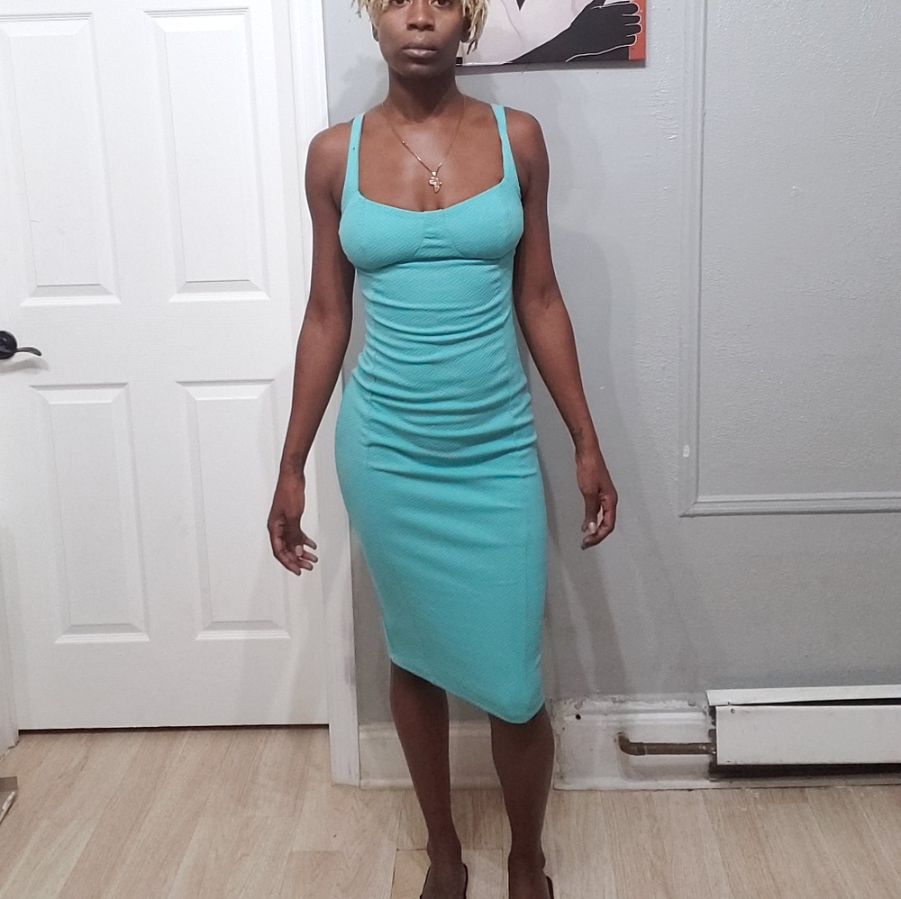 Teal form fitting dress